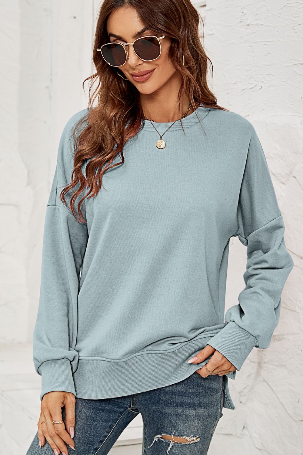 Round Neck Dropped Shoulder Slit Sweatshirt Available in Several Colors
