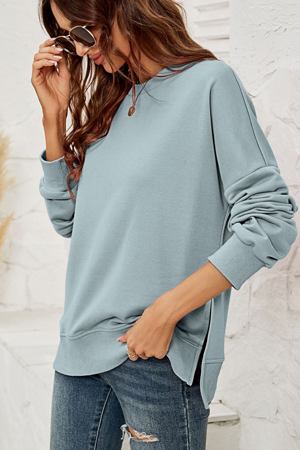 Round Neck Dropped Shoulder Slit Sweatshirt Available in Several Colors
