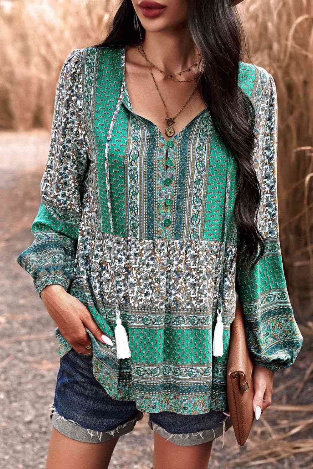 Tassel Tie Long Sleeve Peplum Blouse  [Click for additional options]